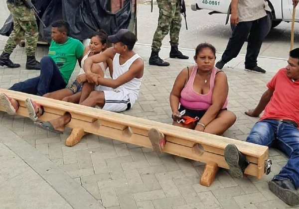 Covid-19 - Cidadãos que desrespeitam isolamento são presos pelo pé na Colômbia