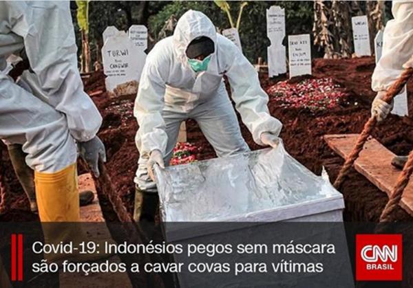 Pessoas sem máscaras são obrigadas a cavar cova para vítimas do coronavírus
